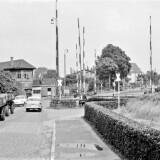 Bad_Oldesloe_Bahnubergang_1961_BR03_Dampflok_Bahnschranke-4