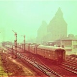 Bad_Oldesloe_Bahnhof_1966_1_V160_Lollo_Hasenkasten_DB_DoSto_LBE_DAB50_Doppelstockwagen_Eilzug_