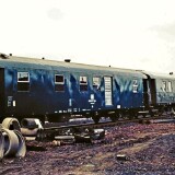 Schienenkran_Gottwald_Bauzug_Bahnhof_Bad_Oldesloe_1976_Gleisvorfeld_gelb_ozeanblau_deutsche_bundesbahn-1