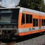 Prignitzer-eisenbahn_bombardier_lvt-s_City_Bahn_DB_Pop_Art_kieselgrau_orange_Bahngarfield_Christian